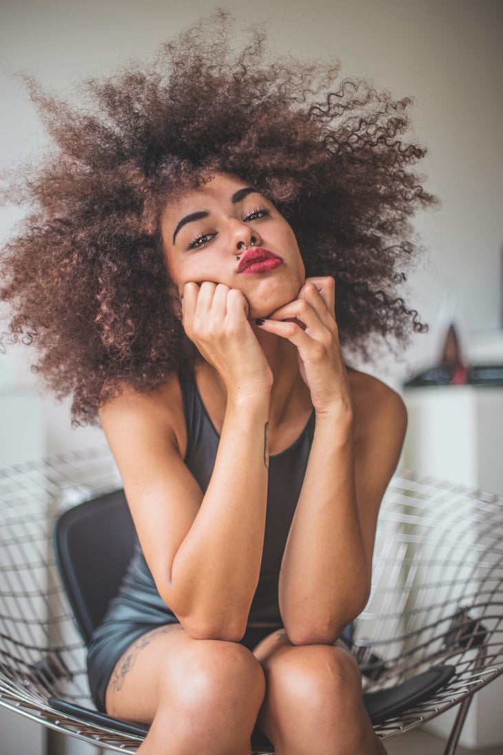 Woman Sitting on Chair